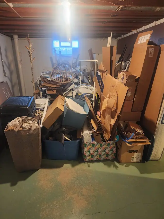 Roll-off dumpster container at job site for Cleanout Dumpster Rental in Geddes